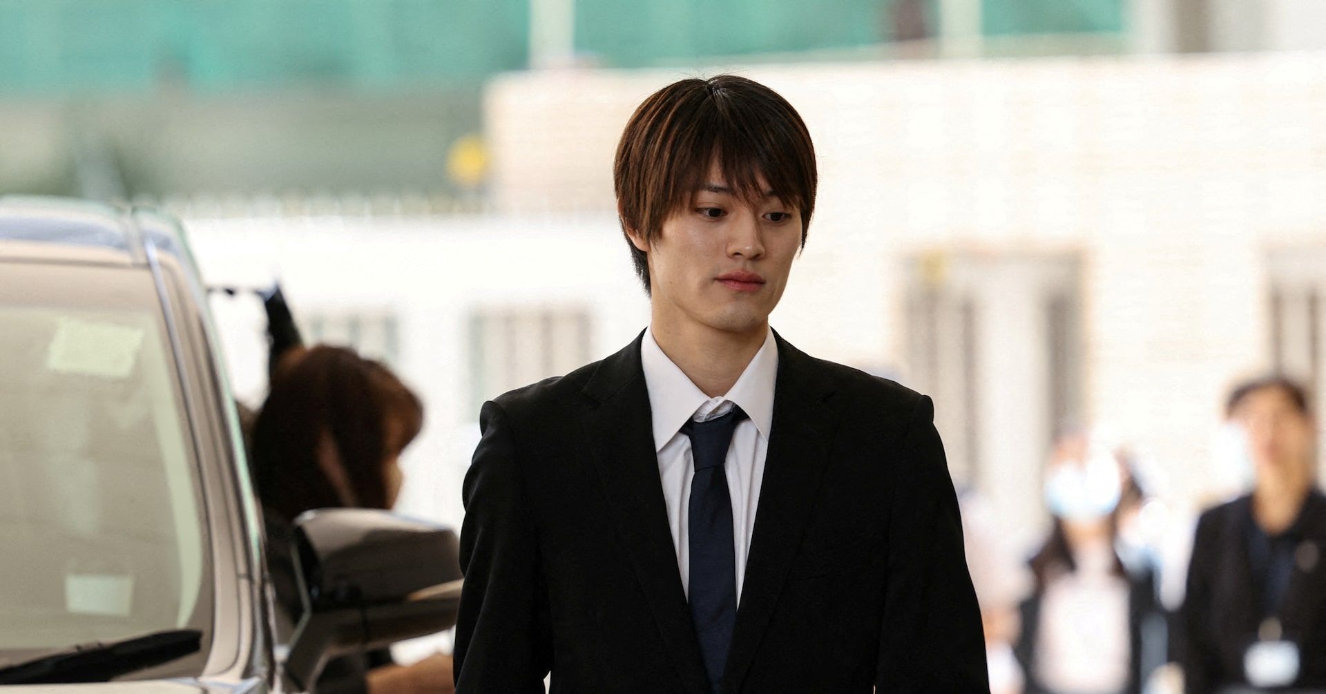 Kenshin Kamimura se declara inocente de acusação de agressão indecente em tribunal de Hong Kong. Reprodução: Reuters