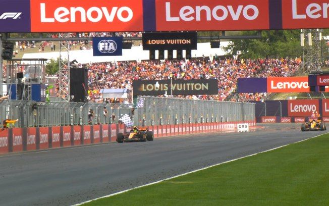 Lando Norris comemora vitória no GP da Hungria, enquanto Charles Leclerc termina em quarto. Reprodução: ig.com.br