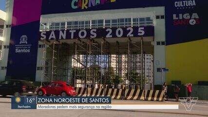 Moradores de Santos protestam contra assaltos com faixas de alerta no bairro Areia Branca.; Reprodução: Globo