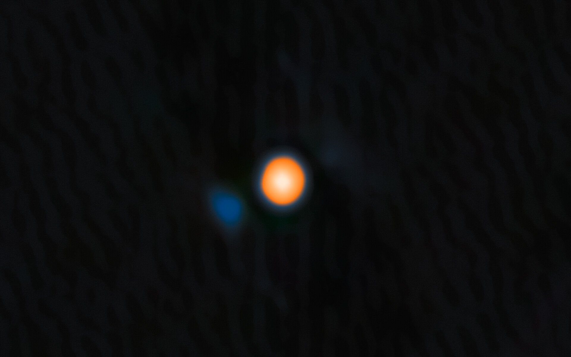 Astrônomos confirmam a existência de uma estrela companheira orbitando Betelgeuse. Reprodução: Gizmodo