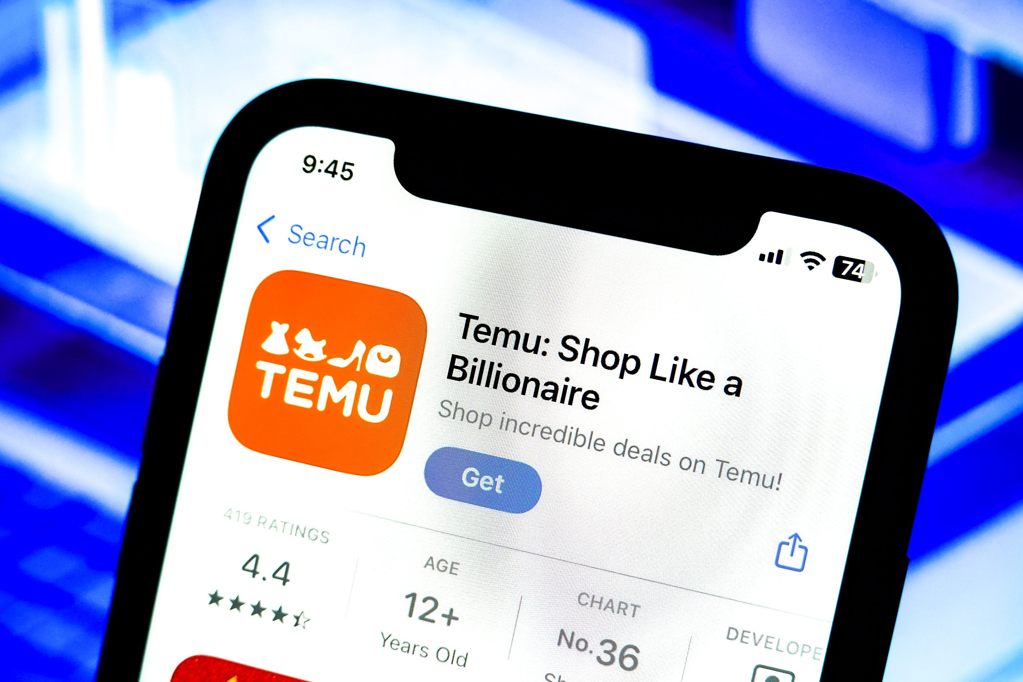 Logotipo do app Temu em iPhone, reportando queda de 38% nos lucros.; Reprodução: Business Insider