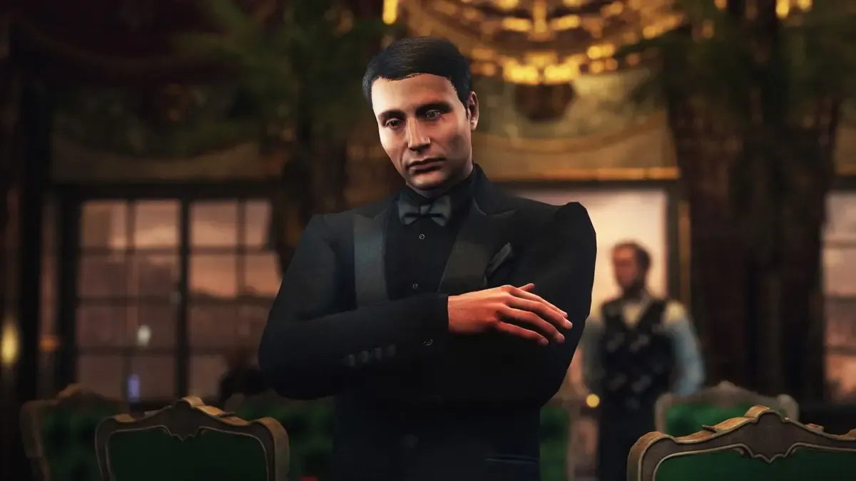 Le Chiffre, de Casino Royale, fará uma aparição em Hitman: World of Assassination. Reprodução: GosuGamers