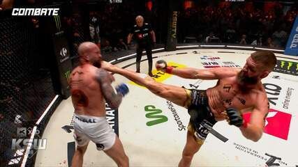 Elijah Smith nocauteia Toshiomi Kazama com golpe brutal no UFC. Legenda da imagem. Reprodução: Globo