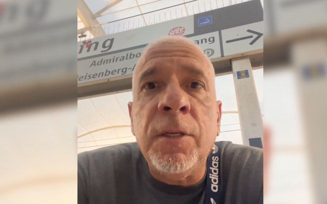 Torcedor do São Paulo, Rogério Barolo, fica do lado de fora do estádio durante a final da Champions League. Reprodução: iG