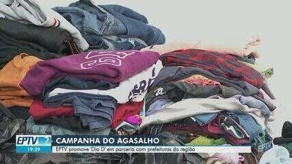 Voluntários organizam e triagem agasalhos arrecadados durante o Dia D em Ribeirão Preto. Reprodução: Globo