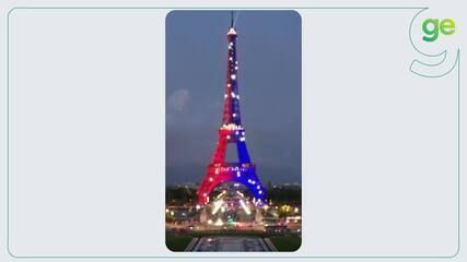 Torre Eiffel ilumina-se em vermelho e azul em celebração ao título da Champions League do PSG. Legenda da imagem. Reprodução: Globo