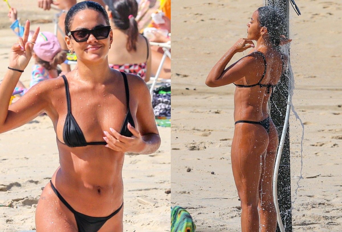 Bella Campos aproveita dia de praia e exibe tatuagens