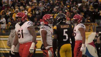 Ja'Marr Chase cospe em jogador dos Steelers durante jogo da NFL. Reprodução: Globo