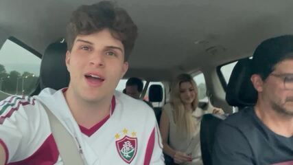 Torcedores do Fluminense dão carona à família de Beraldo após conexão perdida nos Estados Unidos. Reprodução: Globo
