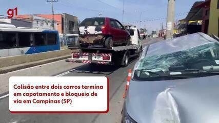 Carro capotado bloqueia rua após batida em Campinas. Reprodução: Globo