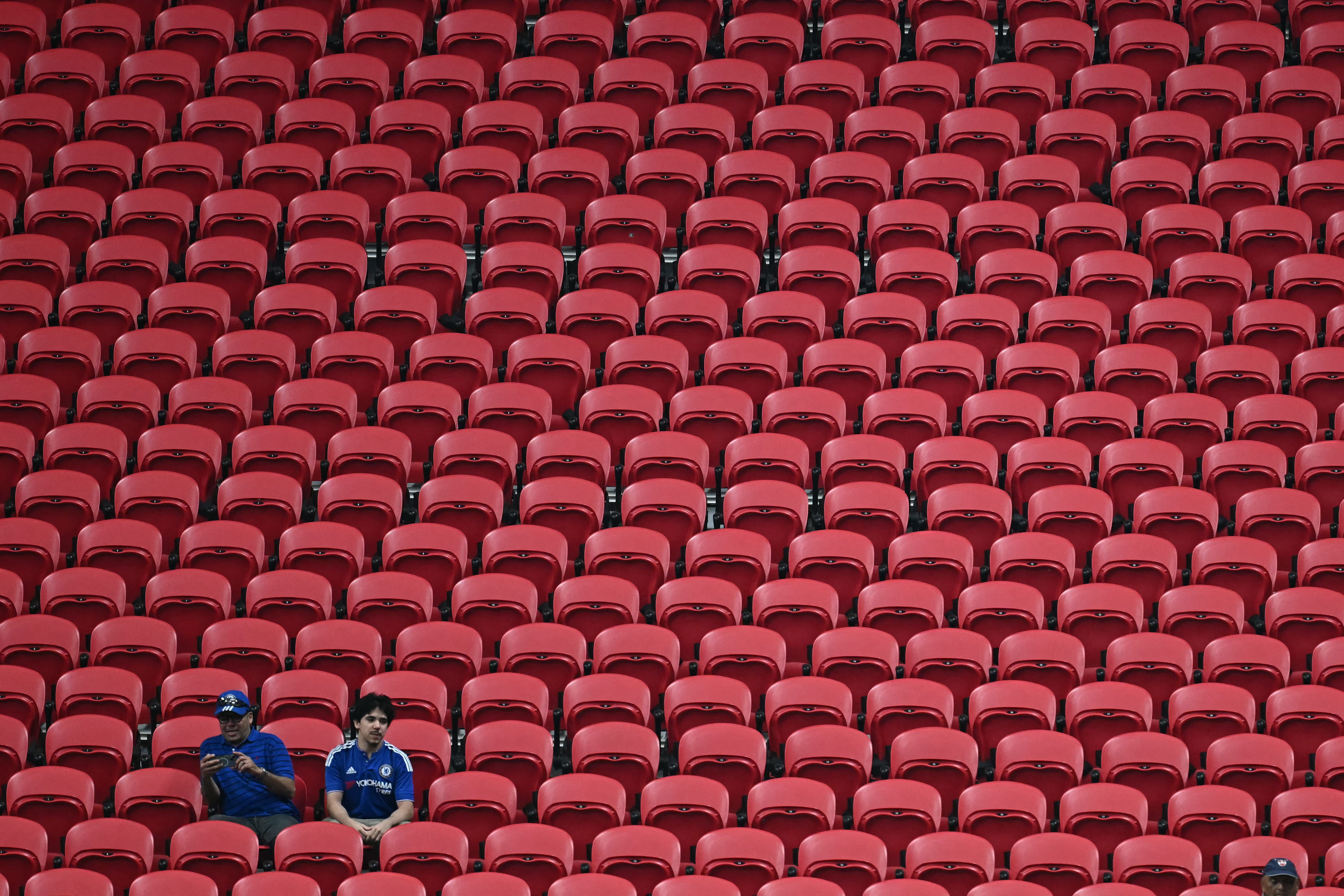 Torcedores do Chelsea em uma seção vazia durante o jogo da FIFA Club World Cup 2025 em Atlanta.; Reprodução: AFP/Getty Images