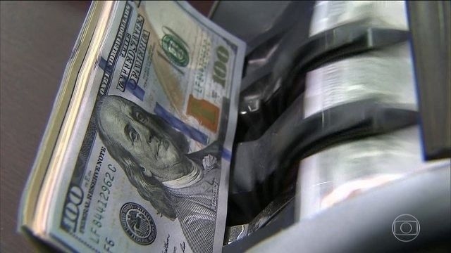 Dólar fecha em alta após anuncio de tarifaço de Donald Trump sobre produtos brasileiros. Reprodução: Globo