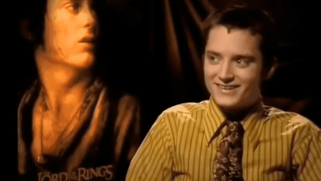 Elijah Wood brinca com perucas durante gravação de O Senhor dos Anéis. Reprodução: IGN Brasil