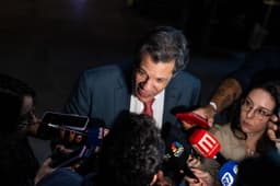 Haddad em evento político em São Paulo, alinhado ao PT na disputa.. Reprodução: Oglobo