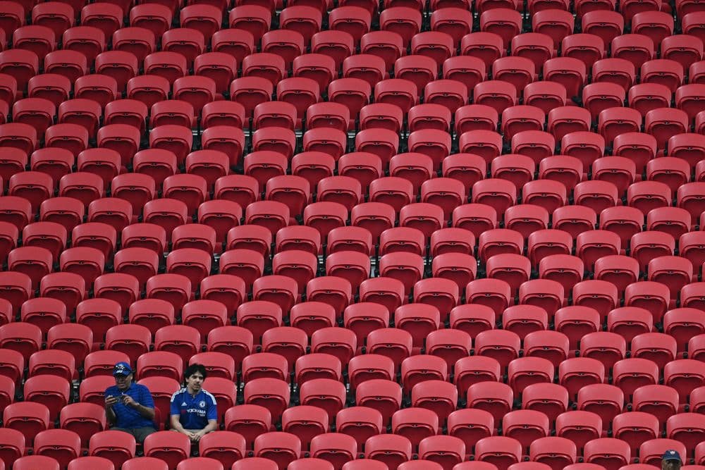 Torcedores do Chelsea em uma seção vazia durante o jogo da FIFA Club World Cup 2025 em Atlanta.; Reprodução: AFP/Getty Images