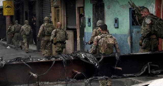 Operação em favelas do Rio reacende debate sobre ocupação policial permanente. Legenda da imagem. Reprodução: Retorno do item 11