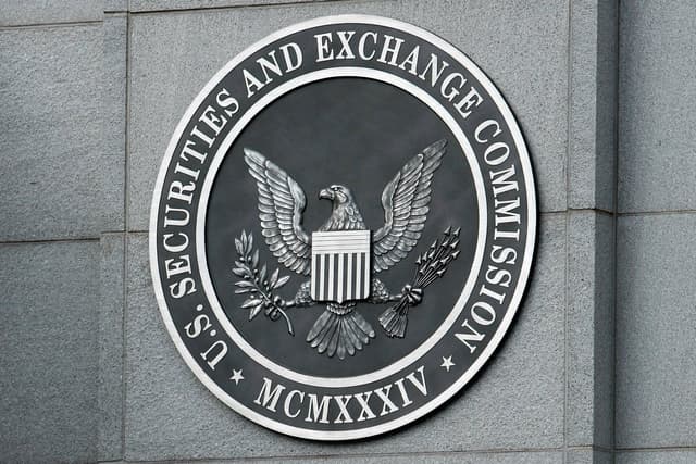 A Comissão de Valores Mobiliários dos EUA reforça regulamentações para criptomoedas com apoio de Trump. Reprodução: Gizmodo