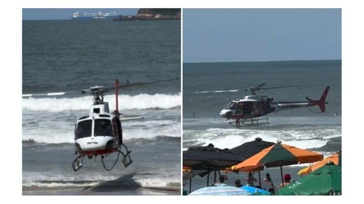 Agentes de resgate ajudam duas pessoas arrastadas pela correnteza. Reprodução: iG